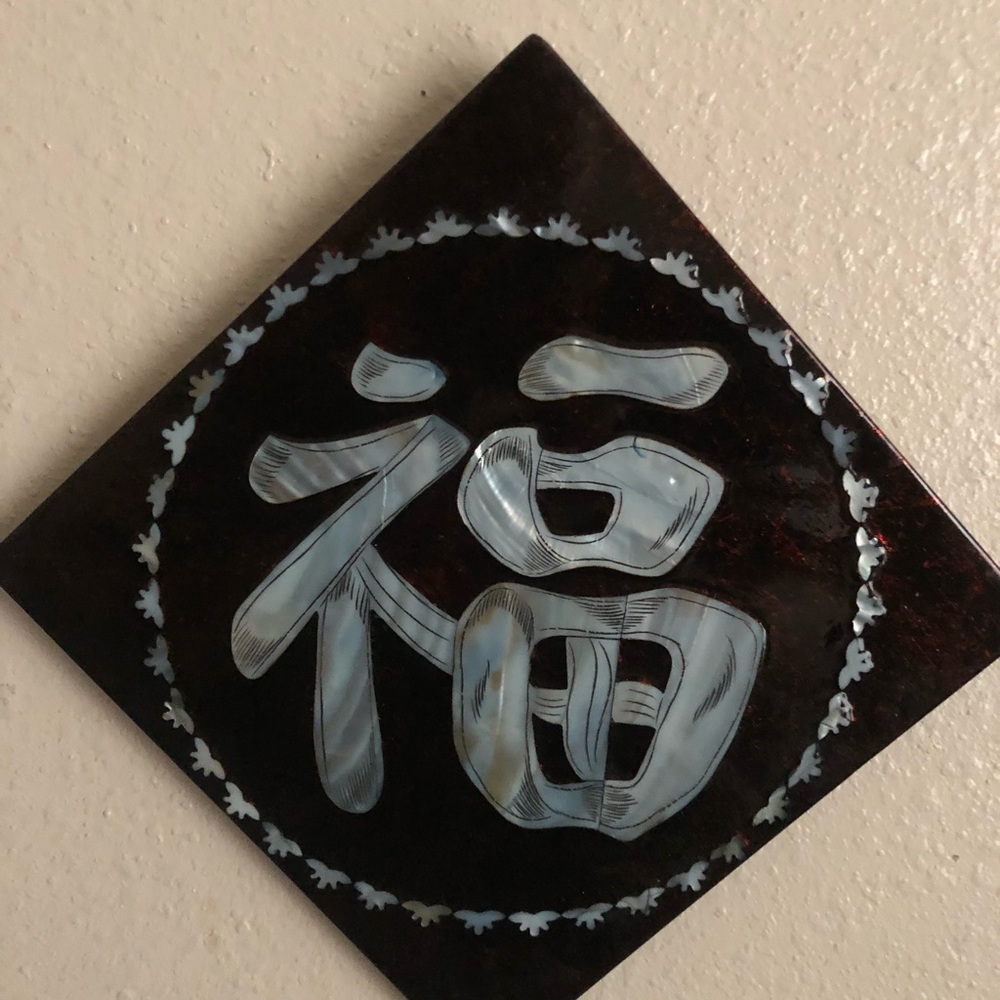 Ceramic Asian plaks.